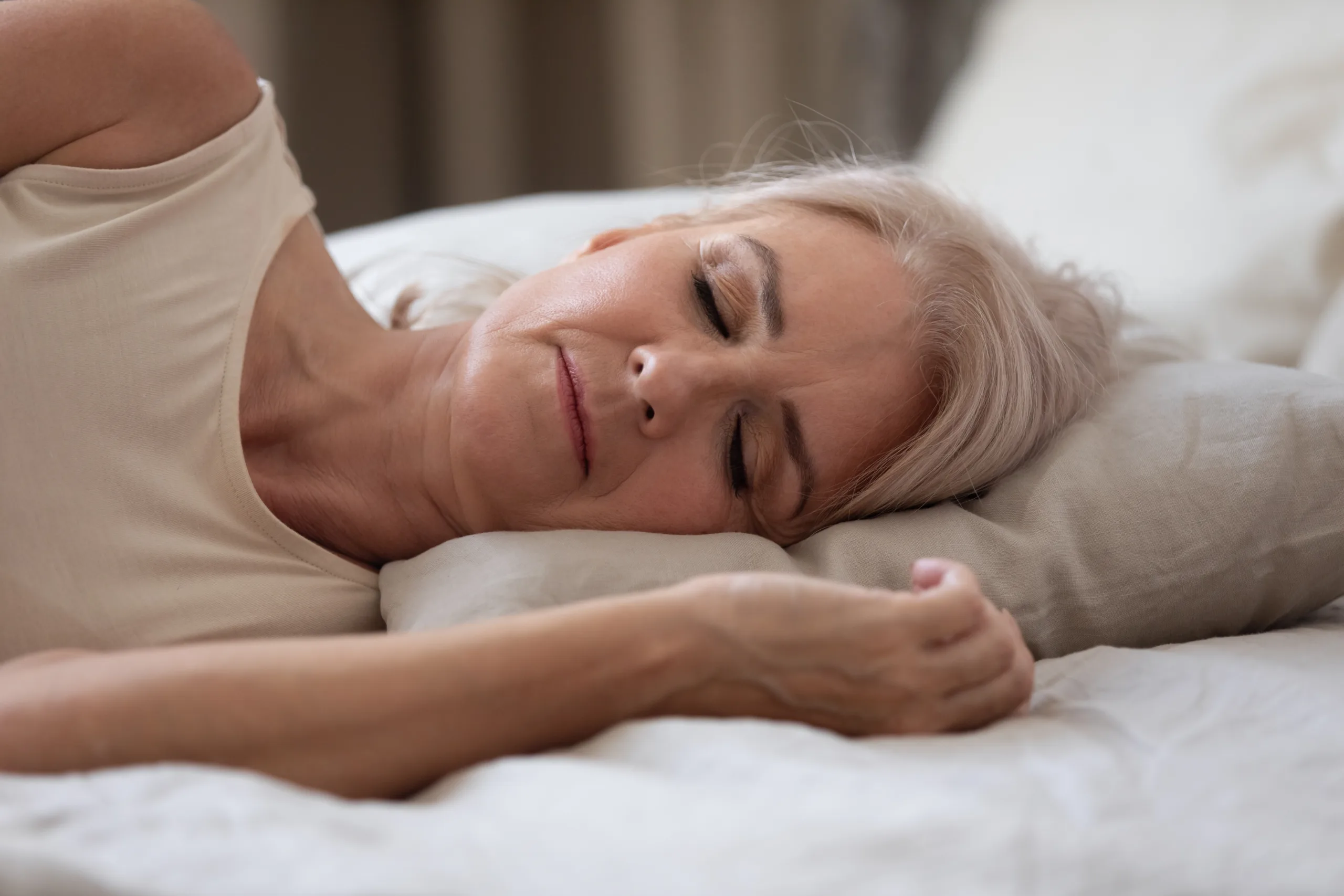 older woman with menopause sleep problems, sleeping. Thoughts Matter Beverly Chappell